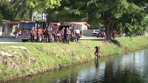 Driver hospitalized after car goes into Hialeah canal